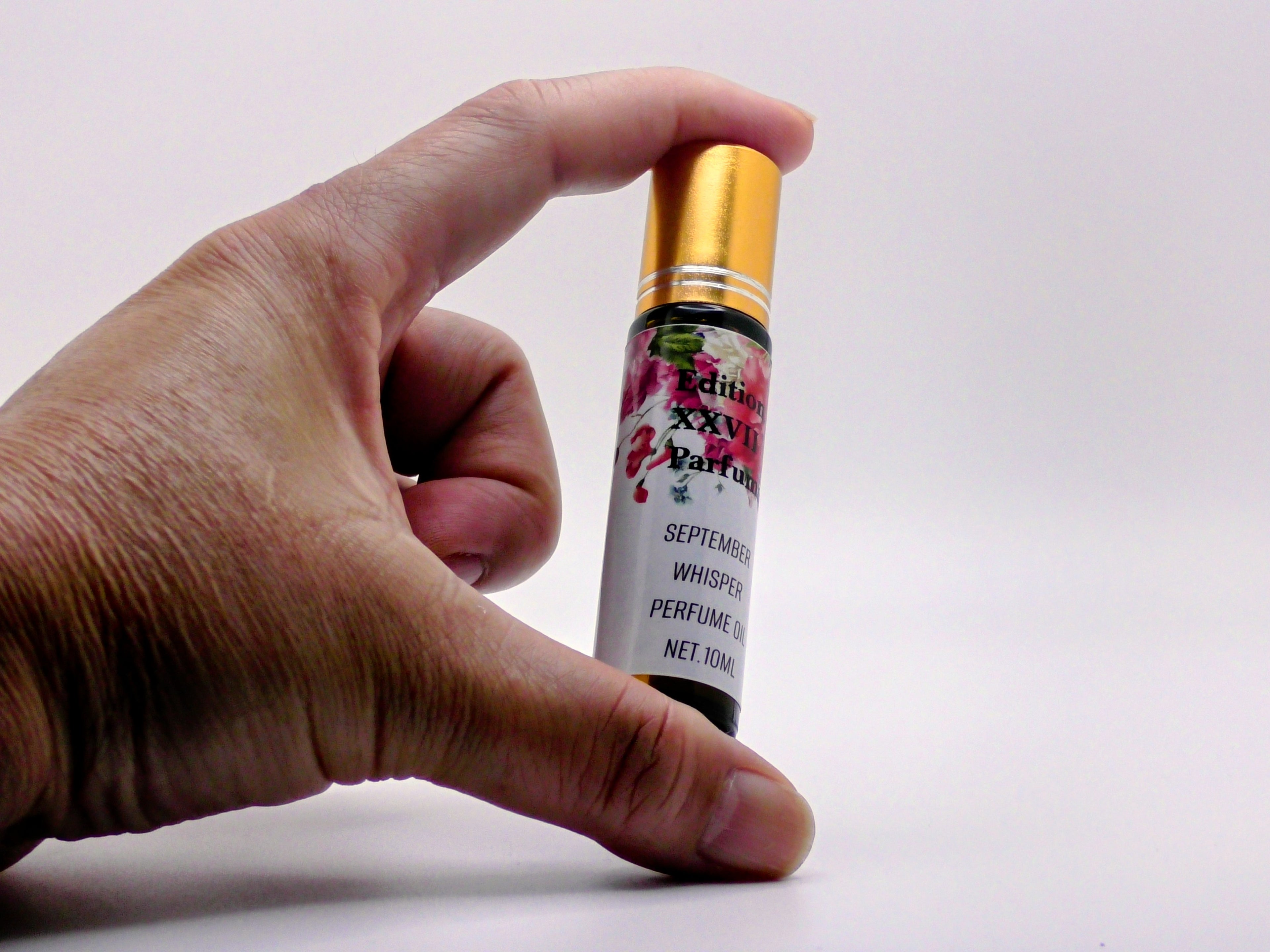 September Whisper Perfume Oil Roll-On -A soft, calming blend of Gardenia, Lily, Orange, and Roman Chamomile. Net. 10 ml