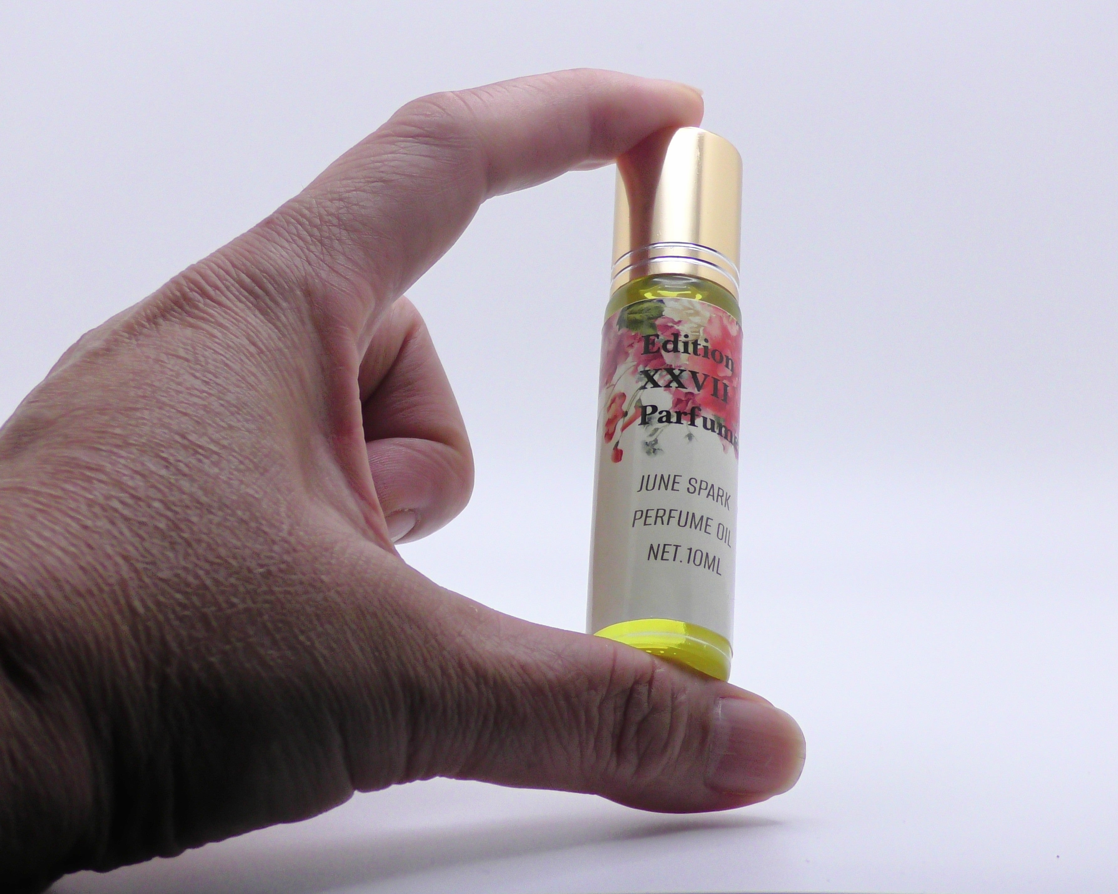 June Spark Perfume Oil Roll-On -A bright floral of Magnolia, Jasmine, and Orange. Net. 10ml